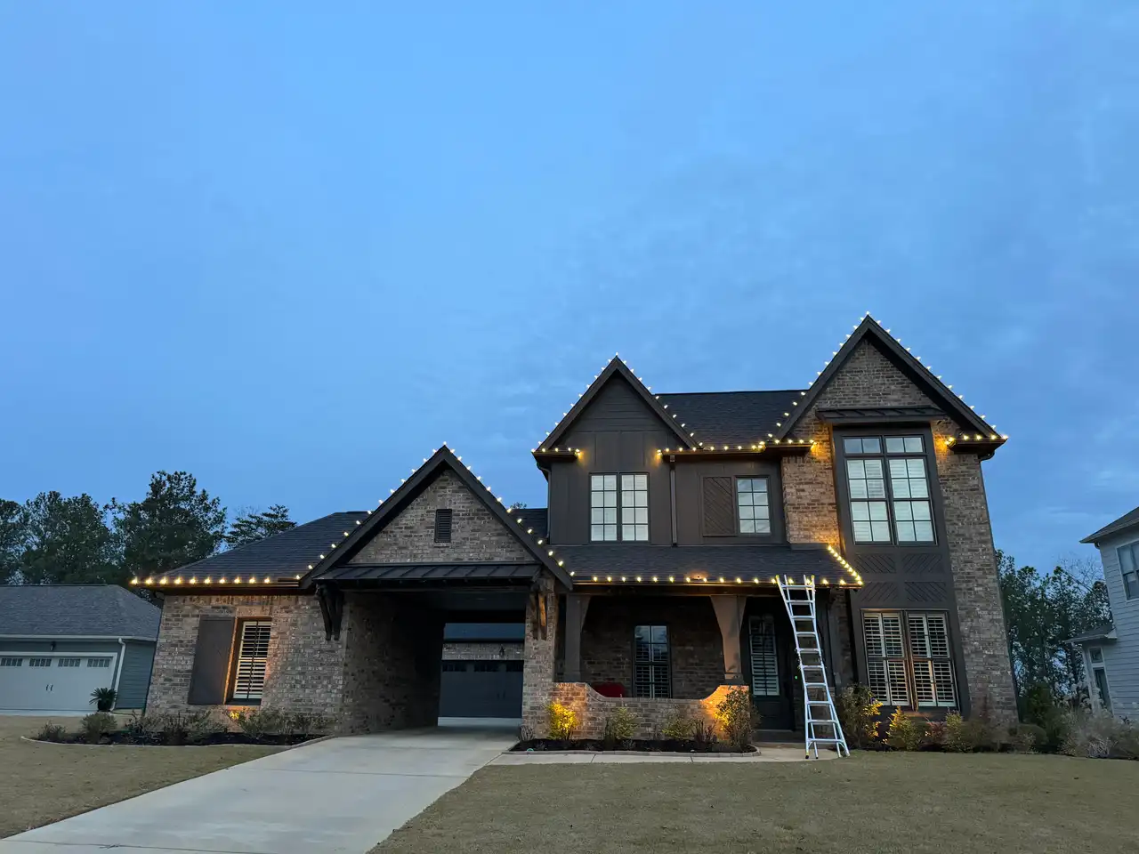 Permanent outdoor lighting installation on a residential home showing the kind of installation Newage Lights services across Tennessee, Alabama, and Ohio